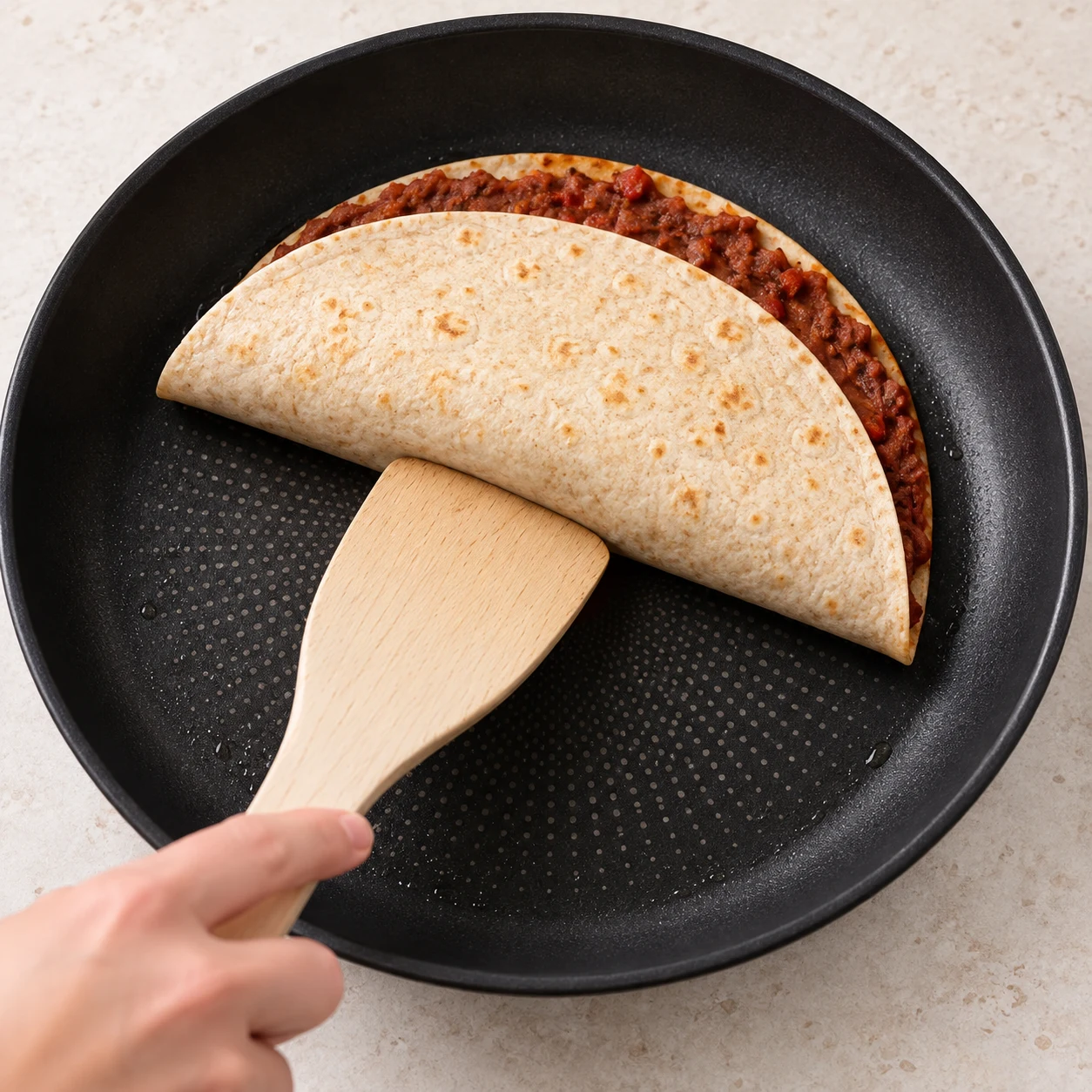 Plier la tortilla